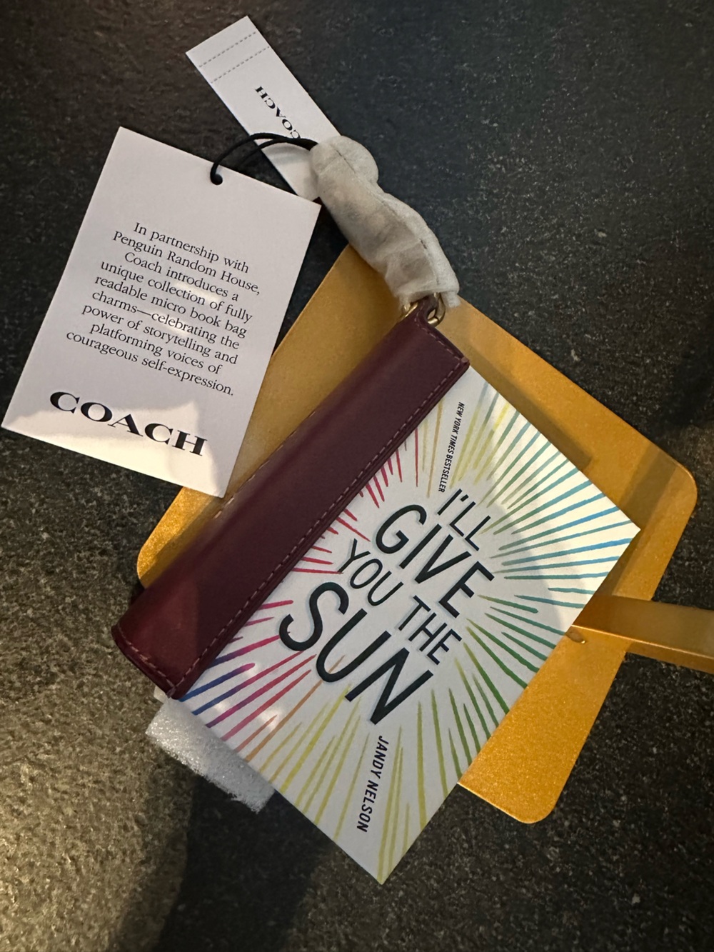 Coach “I’ll give you the Sun” Book Charm